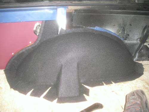 Radkasten mit Teppich bezogen